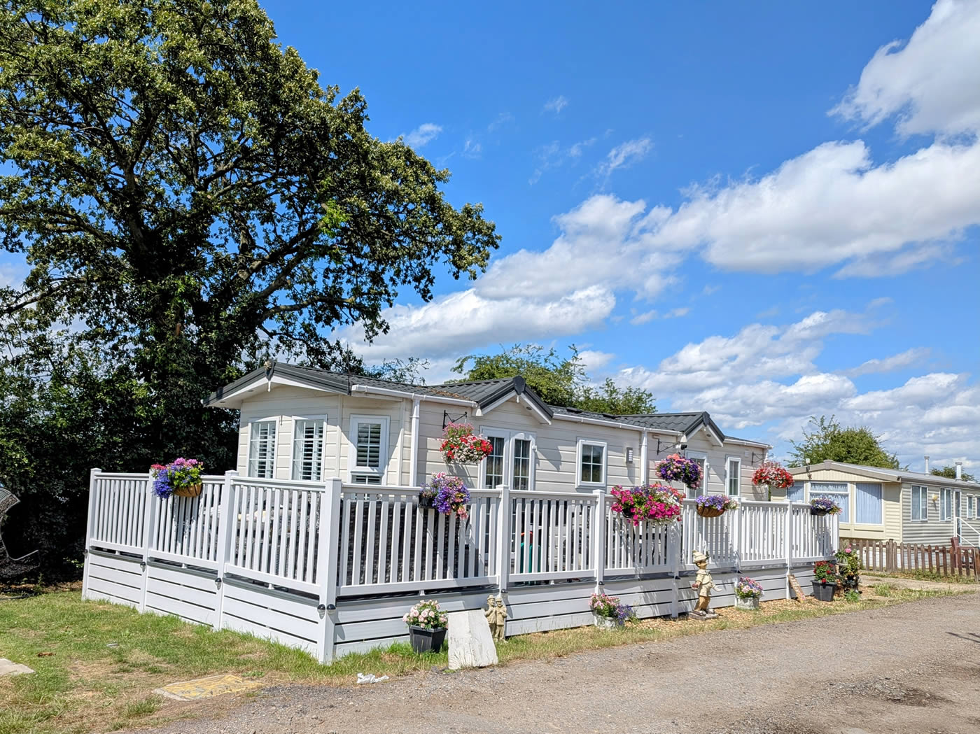 St Lawrence Holiday Park - Park View with flowers